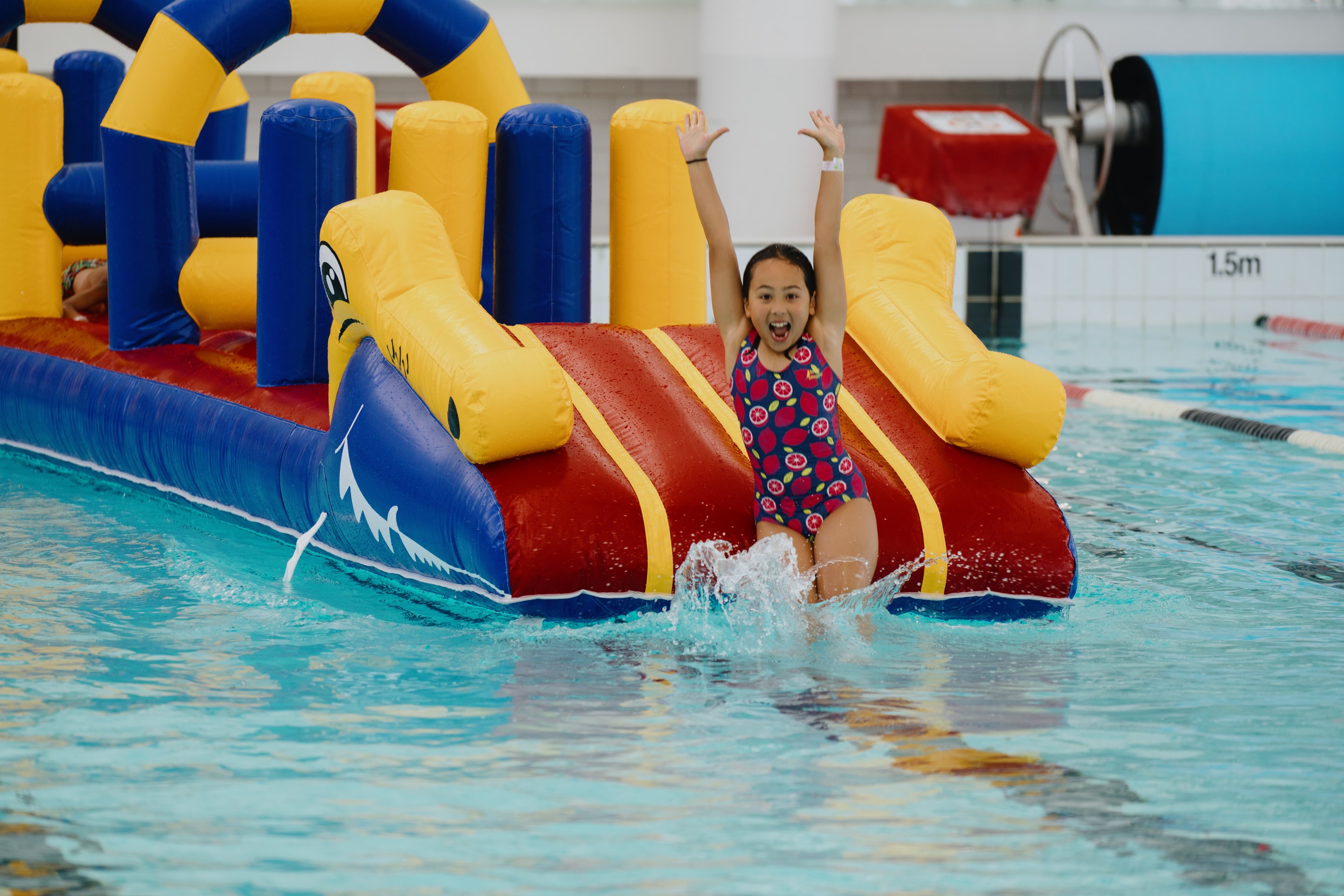Children playing on inflatable