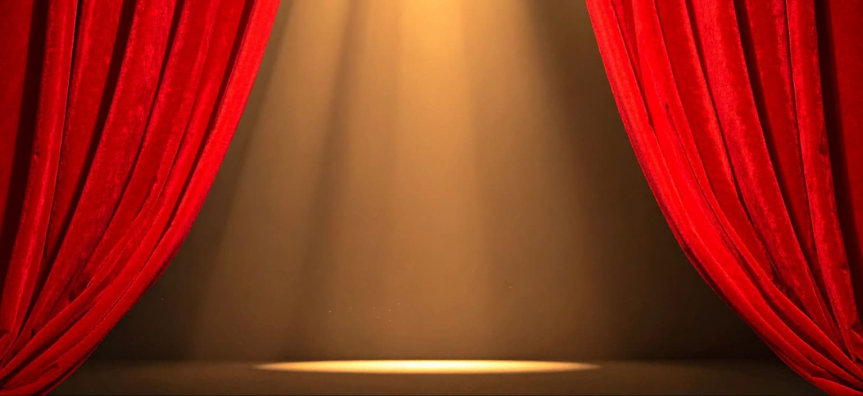 Red curtains on stage