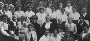 A black and white photograph of a group of women