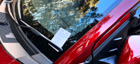 Car with parking notice