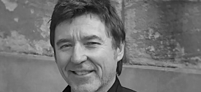 Monochrome portrait of local artist educator David Manley