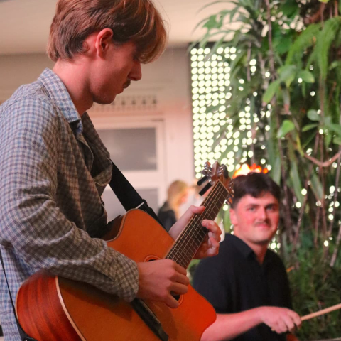 Coolangatta playing on stage