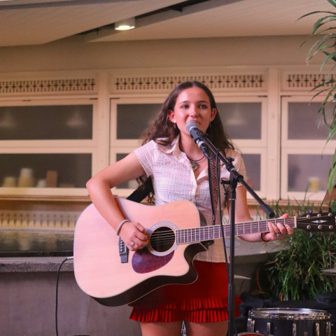 Sophia Julius playing on stage