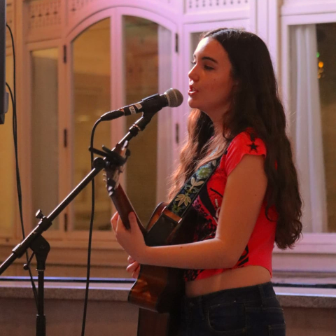 Stella Julius playing on stage