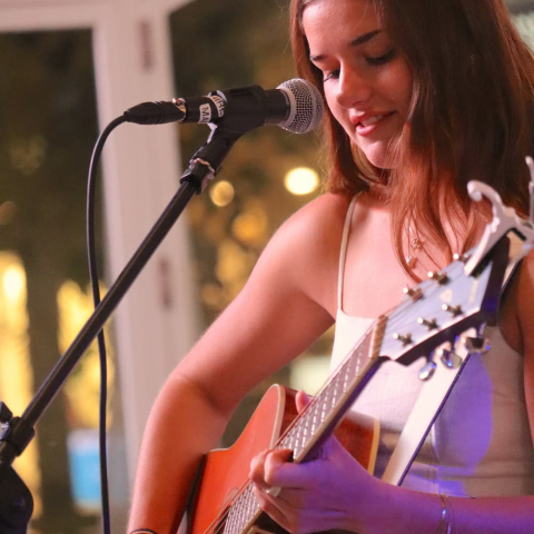 Summer Rain playing on stage